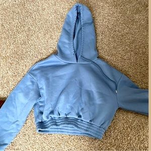 Light blue cropped hoodie, brown cropped hoodie